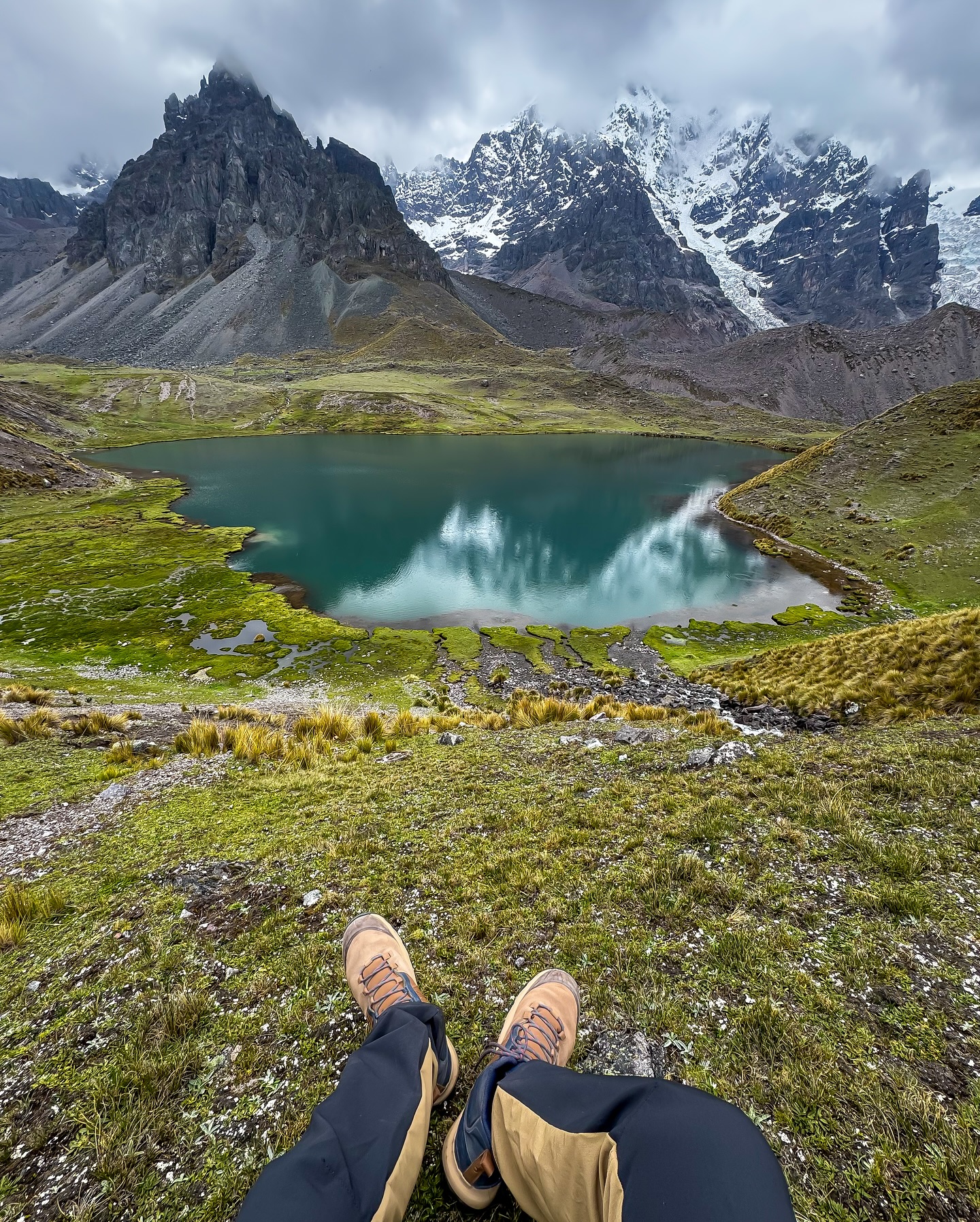 Hiker admiring the stunning 7 Lagoons circuit landscape